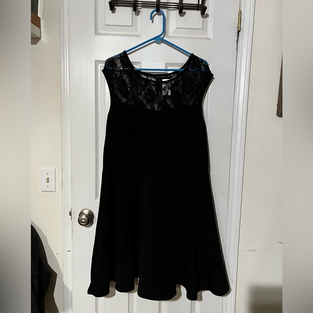 Black Skater Dress with Lace across the very top and sleeve area.
